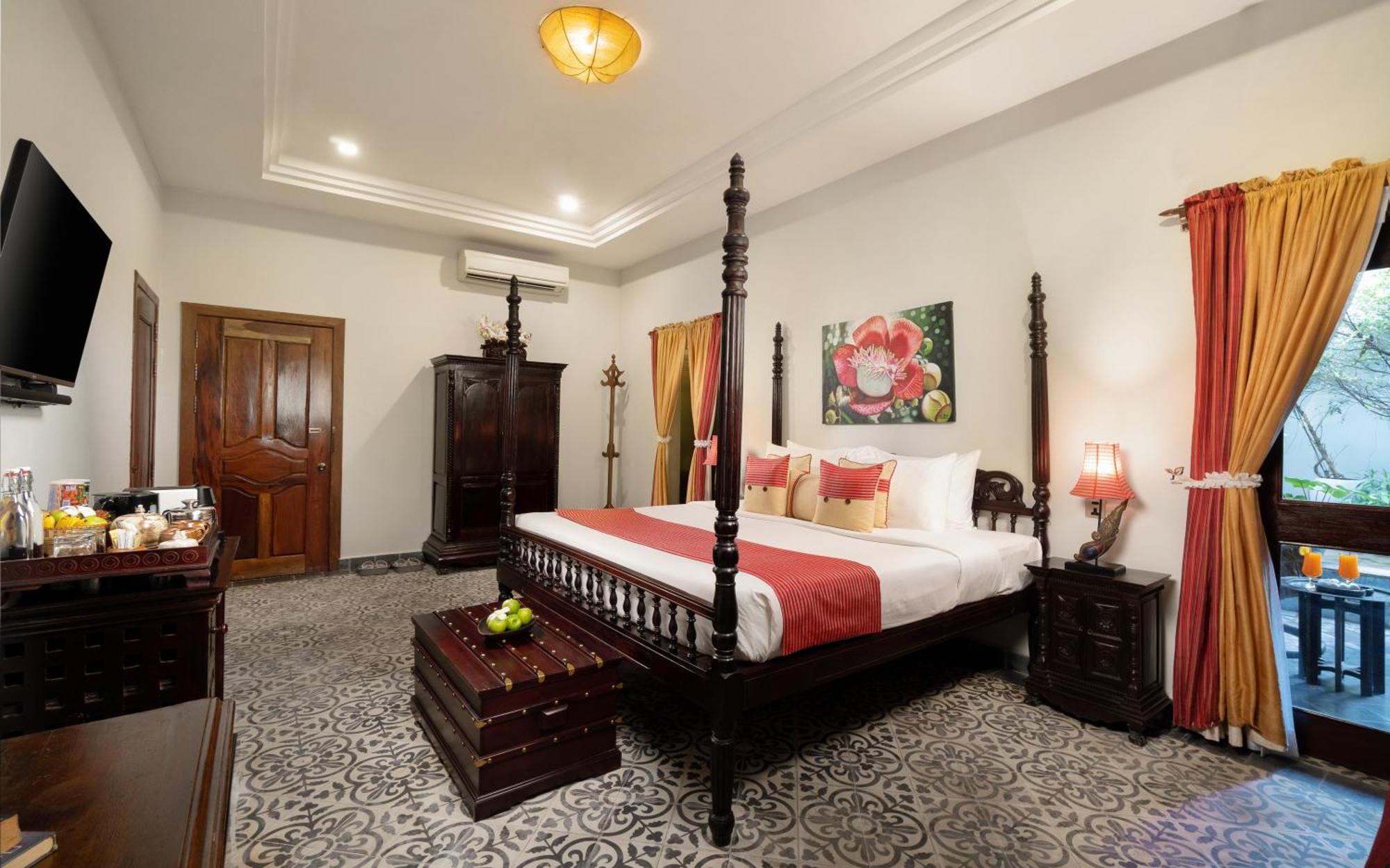 Mane Boutique Hotel & Spa Siem Reap Exterior foto A bedroom at the hotel
